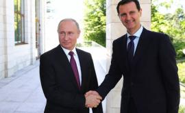 Putin sa întîlnit cu Assad în cadrul unei conferințe video