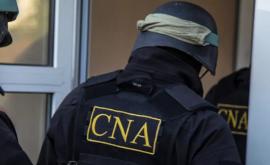 Percheziții CNA la două companii privind obținerea frauduloasă a cetățeniei române