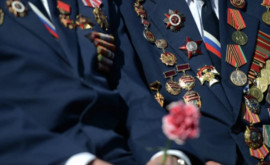 Circa 100 de veterani moldoveni stabiliți cu traiul în străinătate vor primi alocații lunare