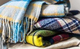 Băncile din Danemarca distribuie pături pentru a ajuta personalul să facă faţă temperaturilor mai scăzute la birou