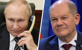 Шольц пообещал продолжить контакты с Путиным