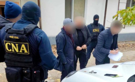Un ofițer de investigații din cadrul Direcției de Poliție a mun Chișinău reținut de CNA în flagrant