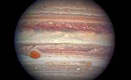 Учёные показали розовый шторм на Юпитере ФОТО