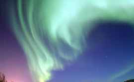НАСА опубликовал фото столкновения полярного сияния с рассветом