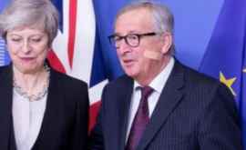Juncker pălmuit de May Explicația oficialului european