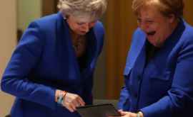 Angela Merkel și Theresa May au rîs în hohote la Bruxelles VIDEO