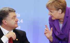 Angela Merkel îl sprijină pe Petro Poroşenko 