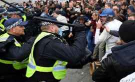 Proteste violente la Londra împotriva măsurilor anti coronavirus